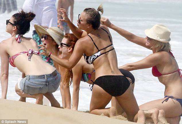 bram stone add kaley cuoco topless beach photo