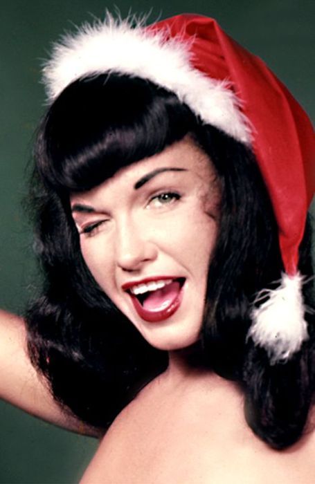 conner muir add bettie page santa hat photo