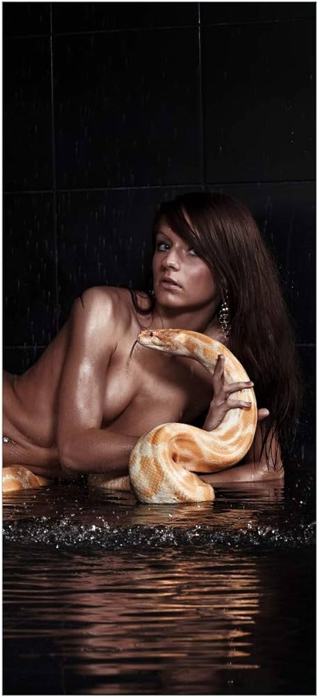 biju anand recommends naked lady with snake pic