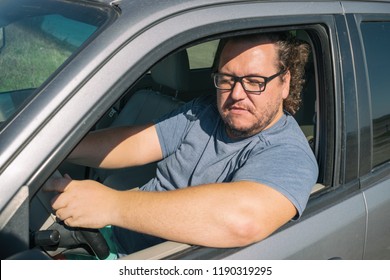 darryl jewell add fat guy small car photo