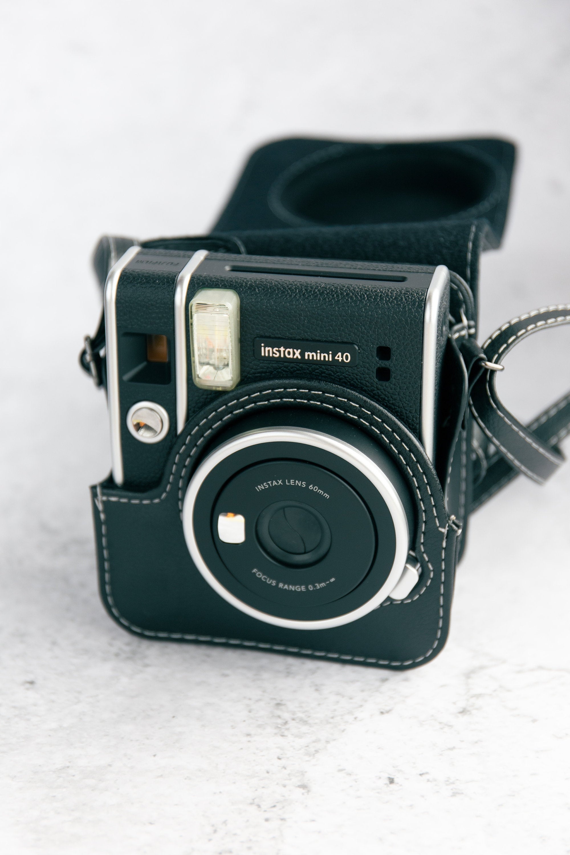 denny dean recommends How To Put Strap On Polaroid Camera