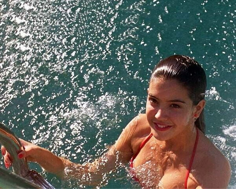 anumita roy share phoebe cates red swimsuit photos