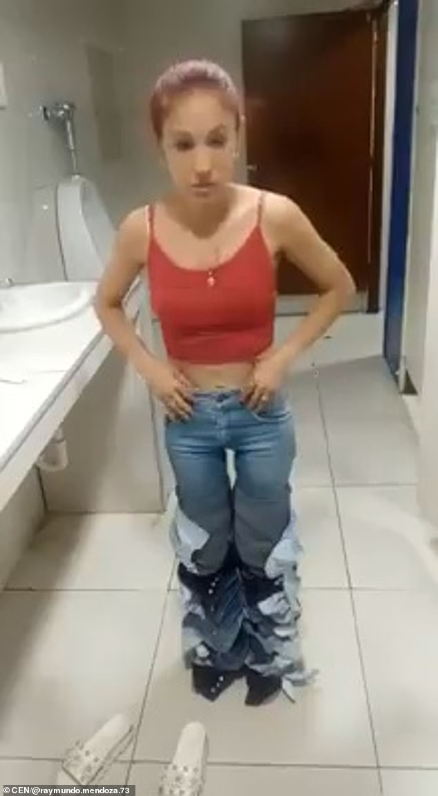 woman pulling down pants