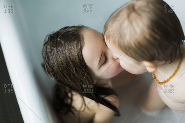 girl kissing in shower