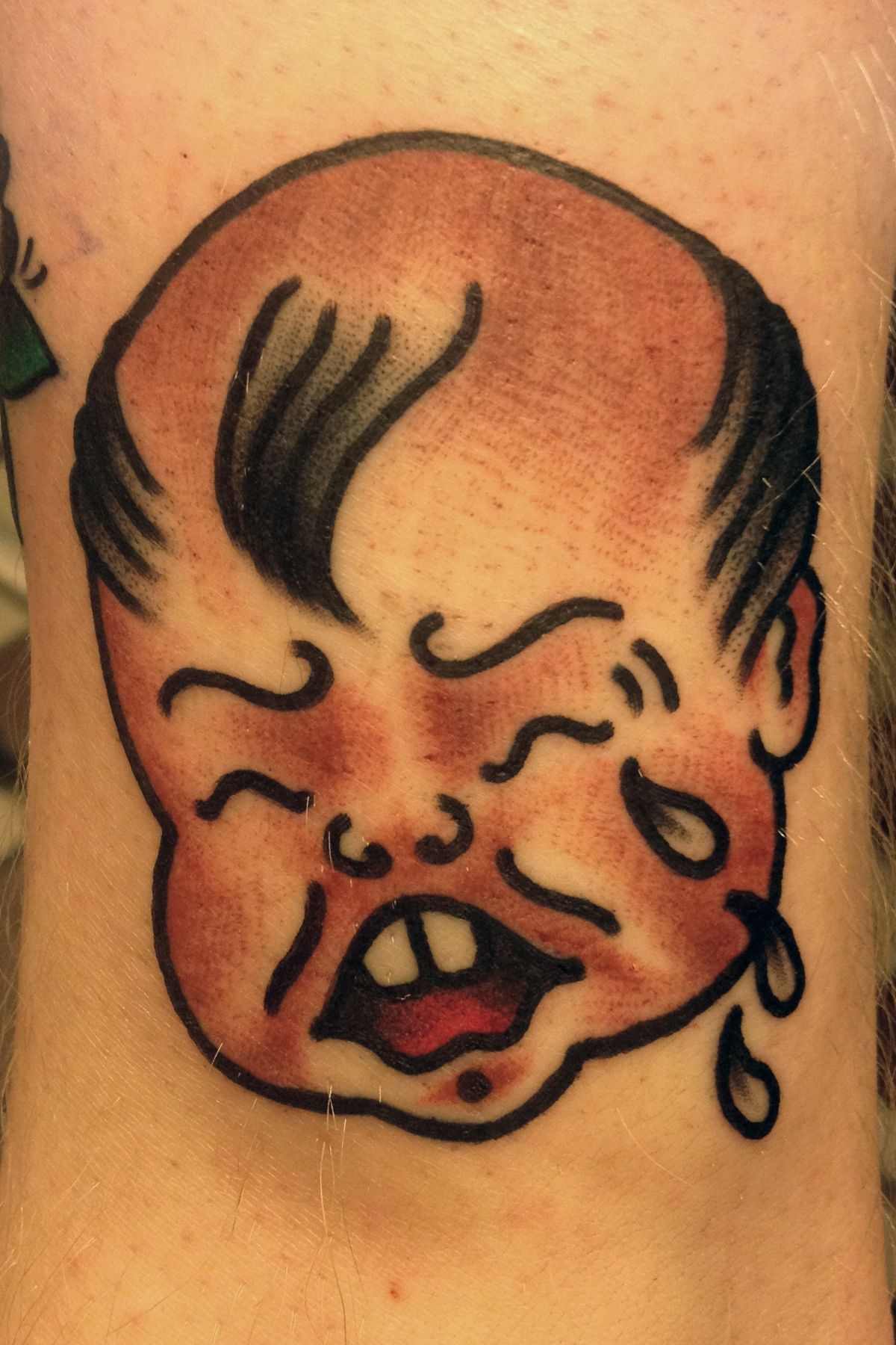 christie beveridge add crying baby tattoo photo