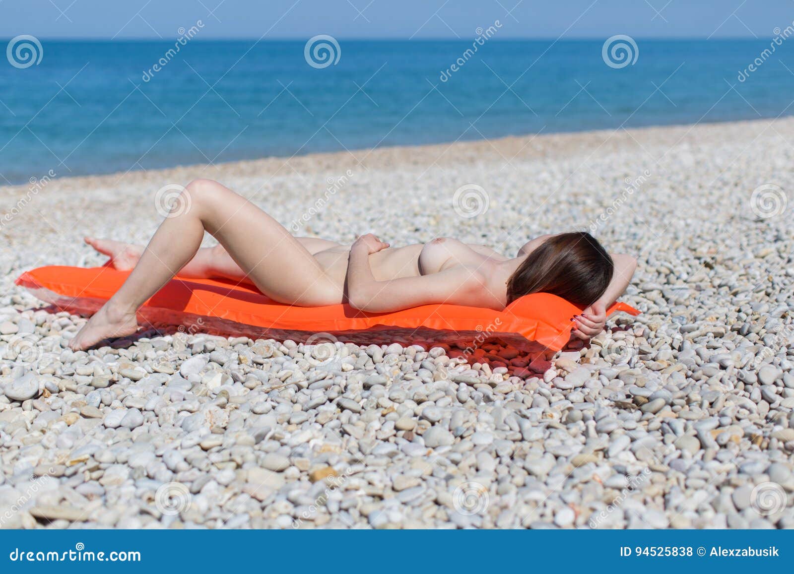 Best of Girl gets naked at beach