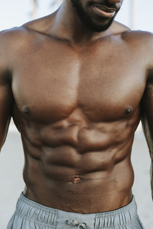 black guy with abs
