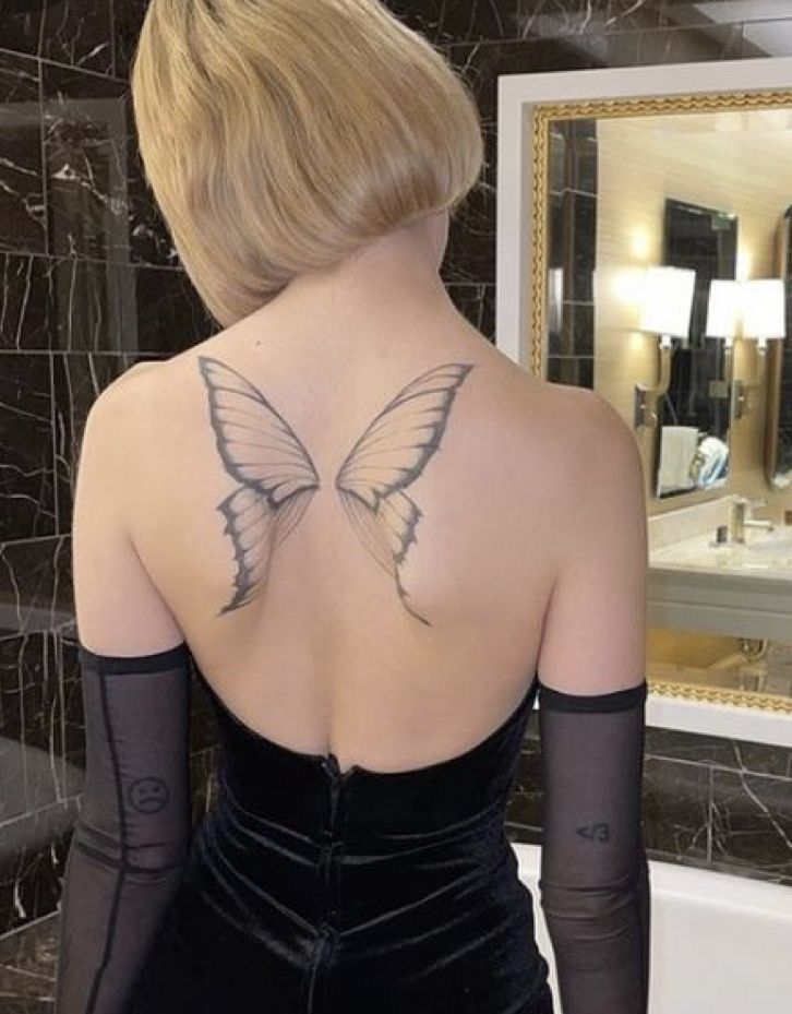 anna pashchenko recommends butterfly wings back tattoo pic