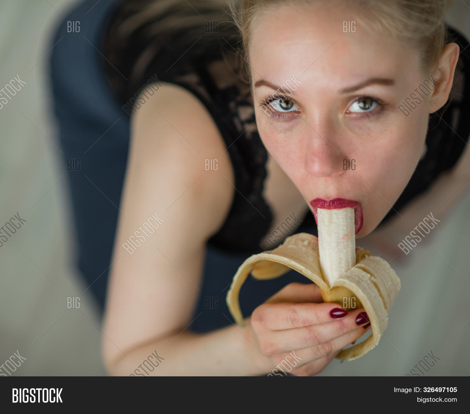 dhurona bokshi add girl sucking on banana photo