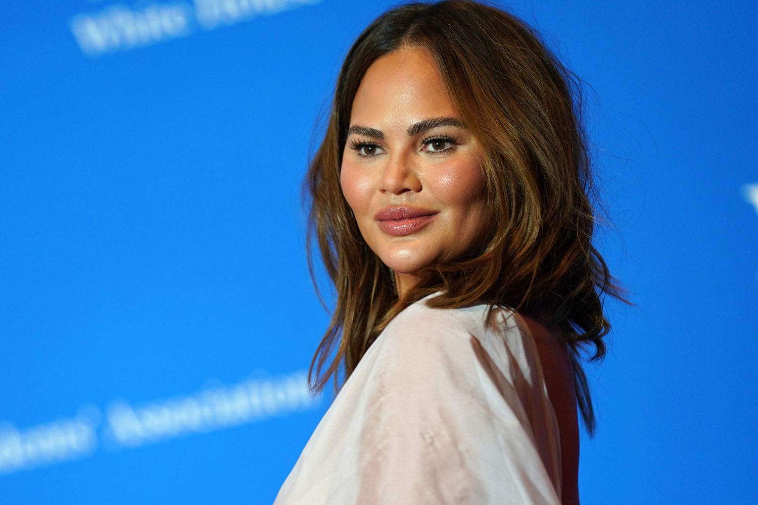 carly werner recommends chrissy teigen up skirt pic