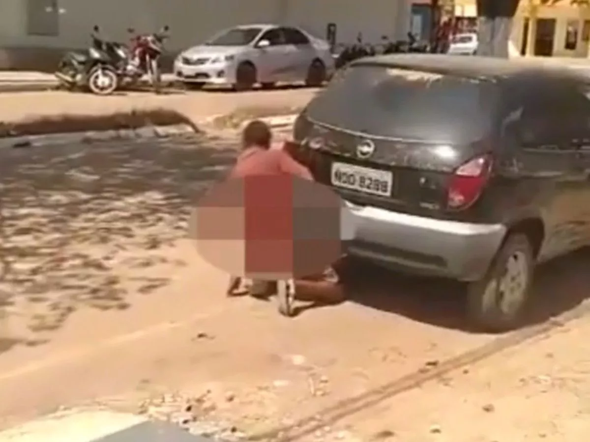 guy having sex with his car