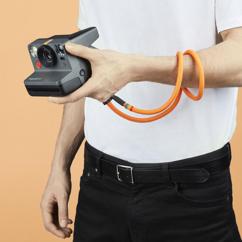 how to put strap on polaroid camera