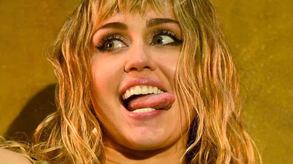 denay johnson recommends miley cyrus sexy tongue pic
