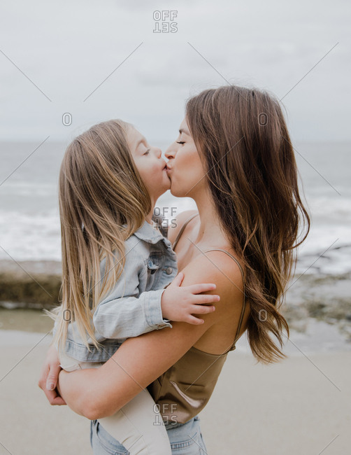 bernardo pascual add moms kissing daughters photo