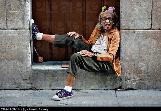 old lady smoking cigar