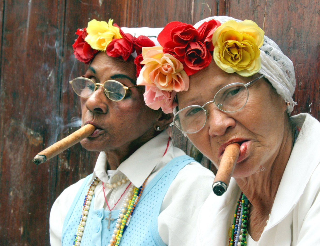 cristian cattaneo share old lady smoking cigar photos