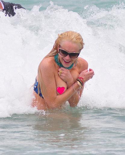 woman losing bathing suit